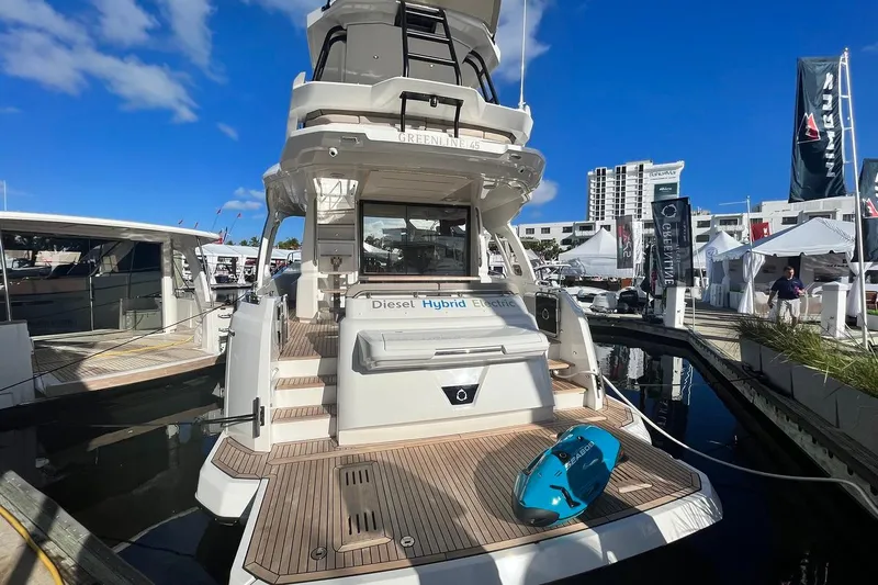 Steel Dreamin Yacht Photos Pics Greenline 45 Fly yacht with hardtop and solar panels, docked at marina, 2022 model.