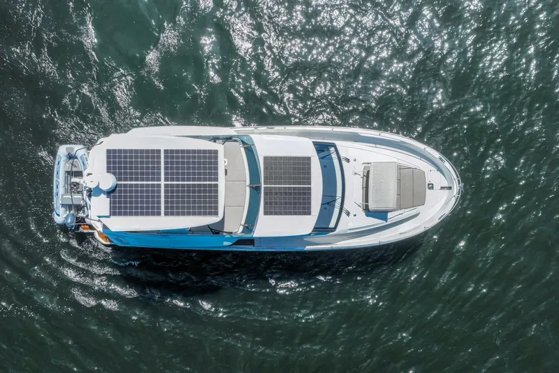 Steel Dreamin Yacht Photos Pics Top view of 2022 Greenline 45 Fly yacht with solar panels on water.