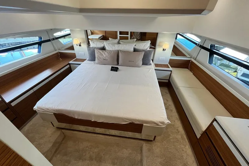 Steel Dreamin Yacht Photos Pics Luxurious bedroom interior of 2022 Greenline 45 Fly yacht with modern design and ample natural light.