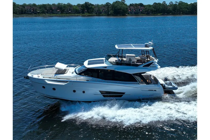 Steel Dreamin Yacht Photos Pics 2022 Greenline 45 Fly yacht with hardtop and solar panels cruising on a sunny day.
