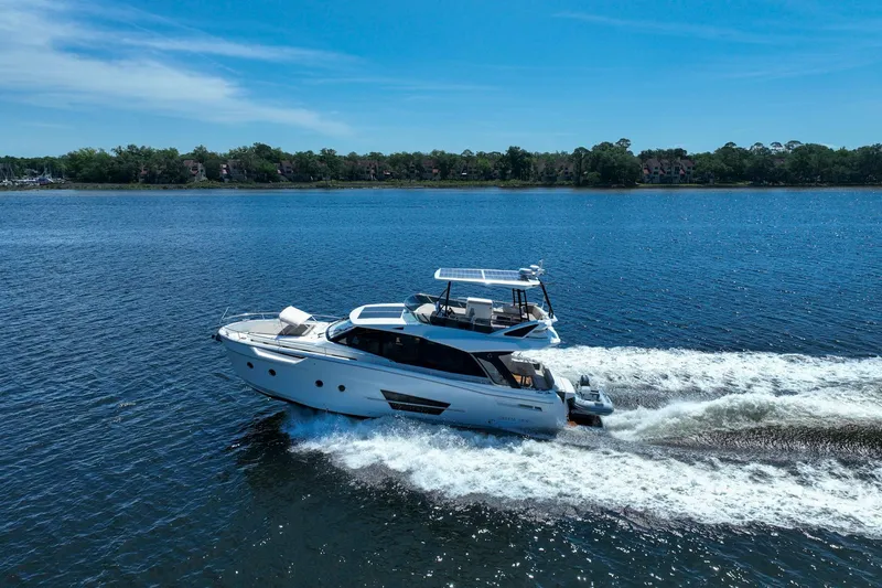 Steel Dreamin Yacht Photos Pics 2022 Greenline 45 Fly yacht with hardtop and solar panels cruising on a sunny day.