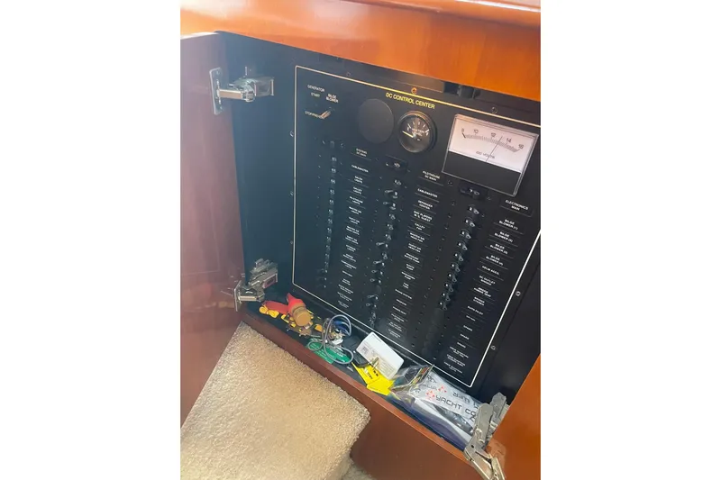 Sea Spirit Yacht Photos Pics Electrical control panel inside 2004 Carver 570 Voyager Pilothouse yacht, with switches and gauges.