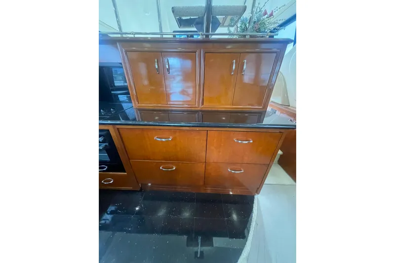 Sea Spirit Yacht Photos Pics Luxurious wooden cabinetry in 2004 Carver 570 Voyager Pilothouse yacht interior.