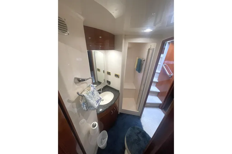 Sea Spirit Yacht Photos Pics Luxurious bathroom in 2004 Carver 570 Voyager Pilothouse yacht with sink and shower.