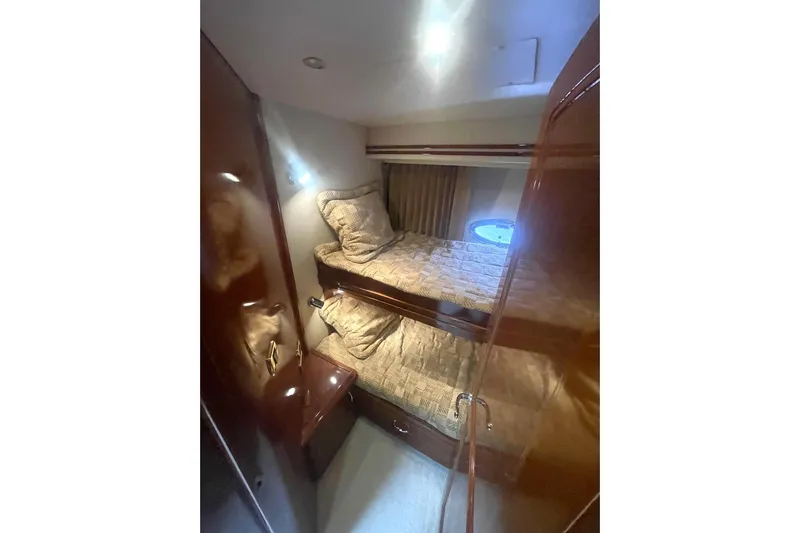 Sea Spirit Yacht Photos Pics Cozy cabin with bunk beds in 2004 Carver 570 Voyager Pilothouse yacht.