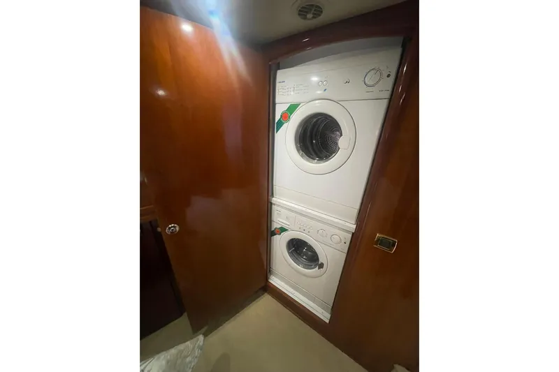 Sea Spirit Yacht Photos Pics Stacked washer and dryer in 2004 Carver 570 Voyager Pilothouse yacht.