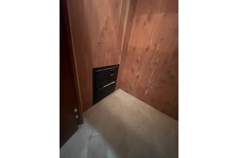 Sea Spirit Yacht Photos Pics Wood-paneled interior of 2004 Carver 570 Voyager Pilothouse with vented panel.