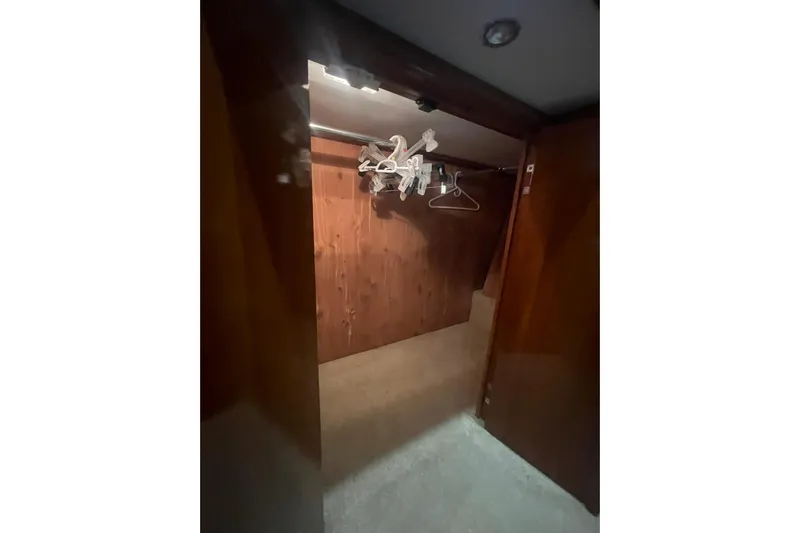 Sea Spirit Yacht Photos Pics Wooden closet interior on 2004 Carver 570 Voyager Pilothouse yacht.