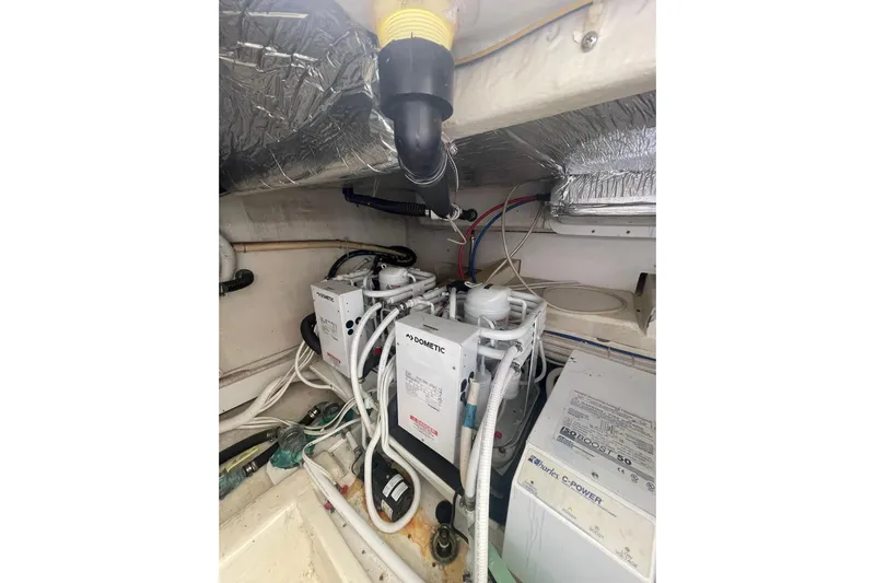 Sea Spirit Yacht Photos Pics Engine room of 2004 Carver 570 Voyager Pilothouse with Dometic equipment and wiring.