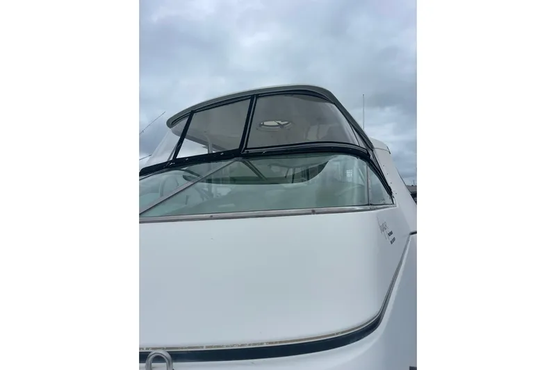 Sea Spirit Yacht Photos Pics 2004 Carver 570 Voyager Pilothouse yacht with sleek design under cloudy sky.