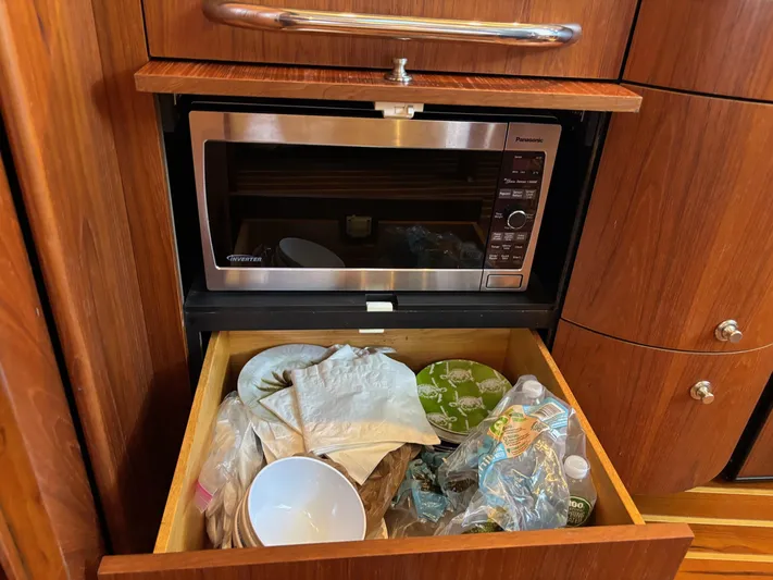 Cruise Prop Too Yacht Photos Pics Microwave and storage drawer in 2010 Tiara Yachts 3900 Sovran kitchen area.