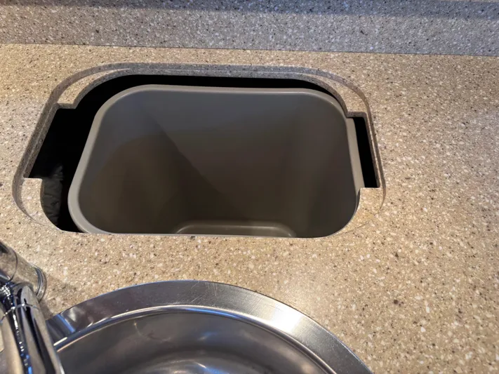 Cruise Prop Too Yacht Photos Pics Built-in trash bin on 2010 Tiara Yachts 3900 Sovran countertop.