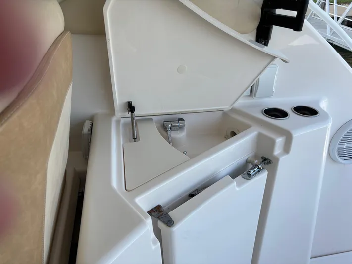 Cruise Prop Too Yacht Photos Pics 2010 Tiara Yachts 3900 Sovran cockpit storage compartment with open hatch.