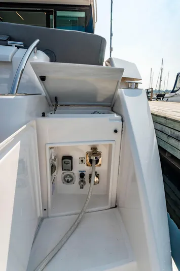  Yacht Photos Pics 2019 Tiara Yachts C49 Coupe power connections on deck, docked at marina.