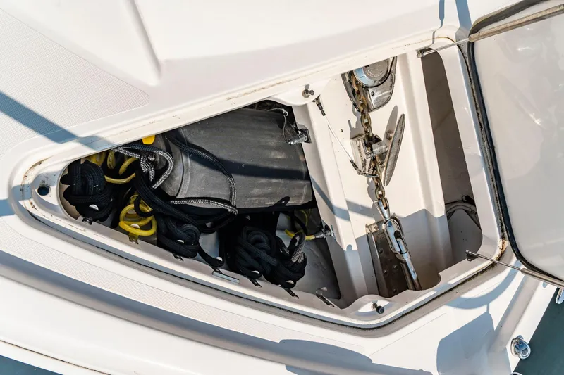  Yacht Photos Pics 2019 Tiara Yachts C49 Coupe anchor locker with ropes and chains.