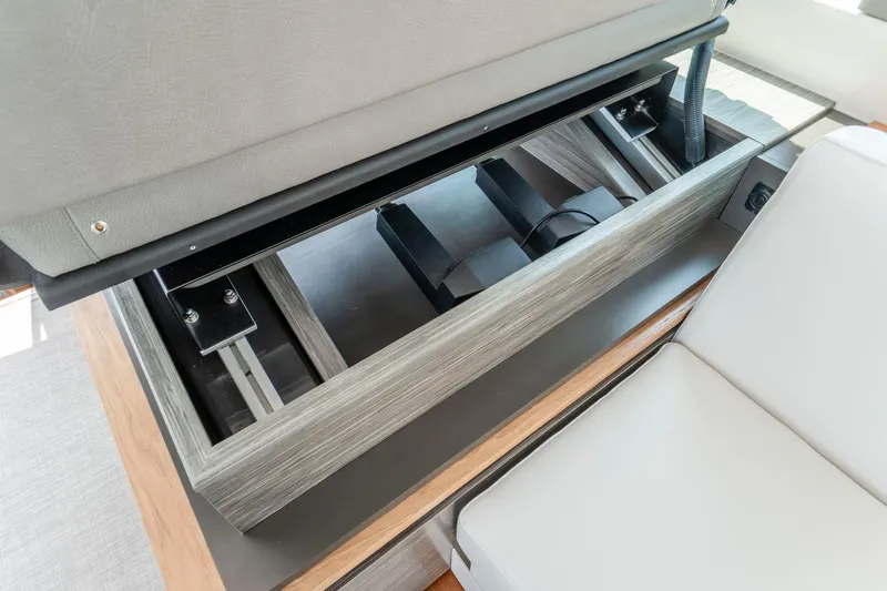  Yacht Photos Pics 2019 Tiara Yachts C49 Coupe interior storage compartment with modern design and sleek finish.