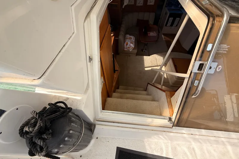  Yacht Photos Pics Interior view of 1998 Silverton 40 Convertible yacht, showing stairs and cabin area.