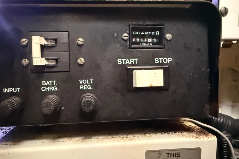  Yacht Photos Pics Control panel of a 1998 Silverton 40 Convertible boat with hour meter and switches.