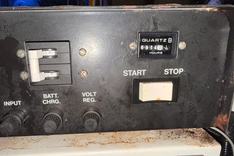  Yacht Photos Pics Control panel of a 1998 Silverton 40 Convertible boat with hour meter and switches.