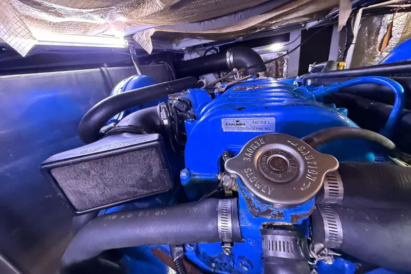  Yacht Photos Pics Engine compartment of a 1998 Silverton 40 Convertible boat, featuring a Crusader engine.