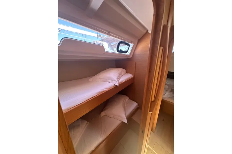 Yacht Photos Pics Cozy bunk beds in 2020 Dufour 430 yacht cabin interior.