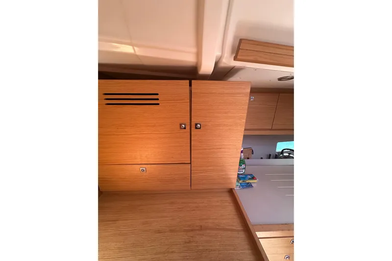  Yacht Photos Pics Interior of 2020 Dufour 430 yacht, featuring wooden cabinetry and modern design elements.