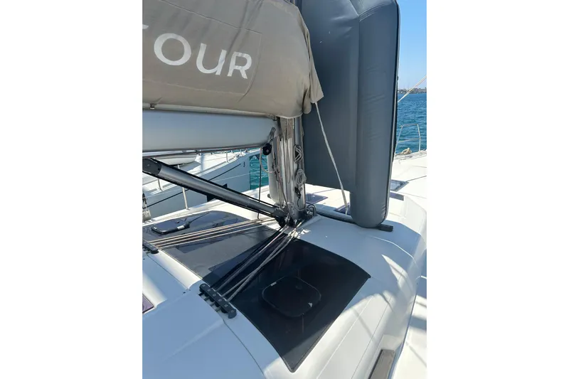  Yacht Photos Pics Dufour 430 sailboat deck, 2020 model, with rigging and sail cover, on a sunny day.