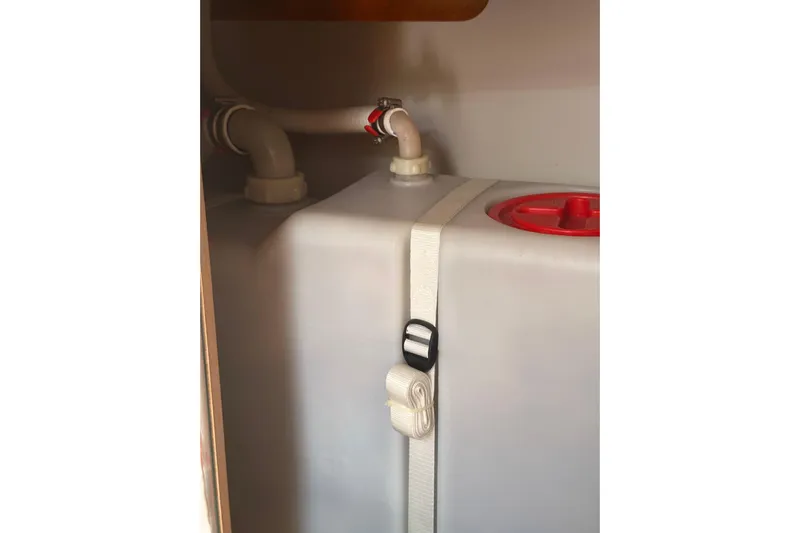  Yacht Photos Pics Water tank with secure strap in 2020 Dufour 430 yacht interior.