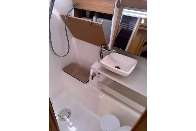  Yacht Photos Pics Bathroom interior of 2020 Dufour 430 yacht with modern sink and shower.