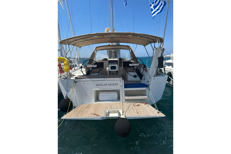 Yacht Photos Pics 2020 Dufour 430 sailboat docked, featuring dual steering wheels and a spacious deck.