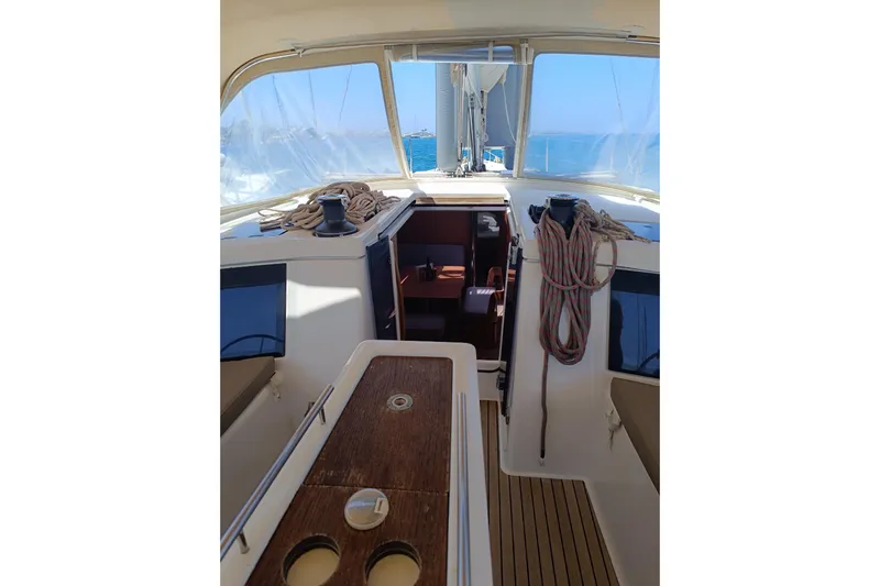 Yacht Photos Pics Interior view of 2020 Dufour 430 sailboat cockpit with ropes and seating.