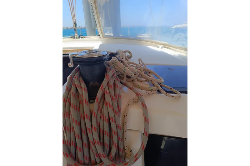  Yacht Photos Pics Winch and ropes on a 2020 Dufour 430 sailboat deck, with ocean view.