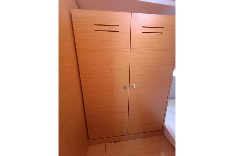  Yacht Photos Pics Wooden wardrobe in 2020 Dufour 430 yacht interior cabin.