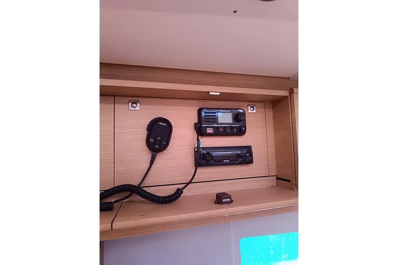  Yacht Photos Pics Control panel inside a 2020 Dufour 430 yacht, featuring communication equipment.