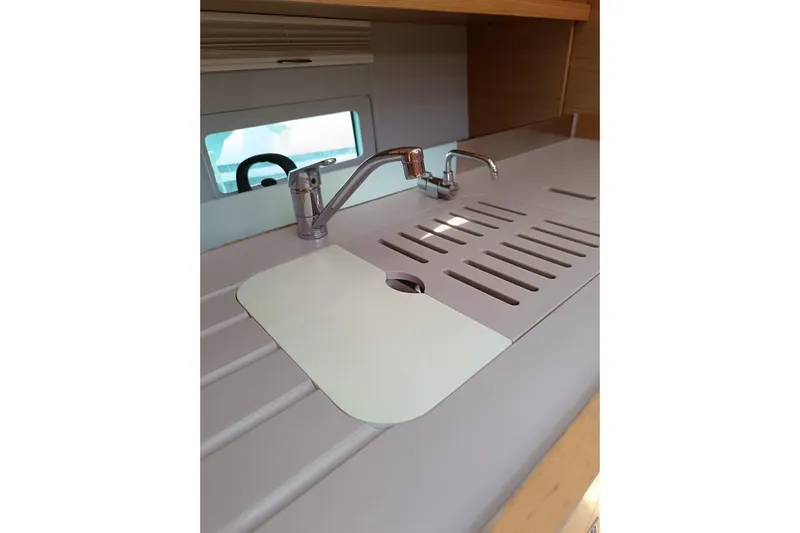  Yacht Photos Pics Modern kitchen sink on 2020 Dufour 430 yacht with sleek faucet design.