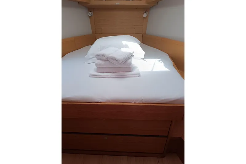  Yacht Photos Pics Cozy cabin bed with fresh linens on 2020 Dufour 430 yacht.
