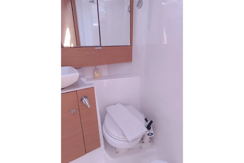  Yacht Photos Pics Modern bathroom in 2020 Dufour 430 yacht with wooden cabinetry and compact design.