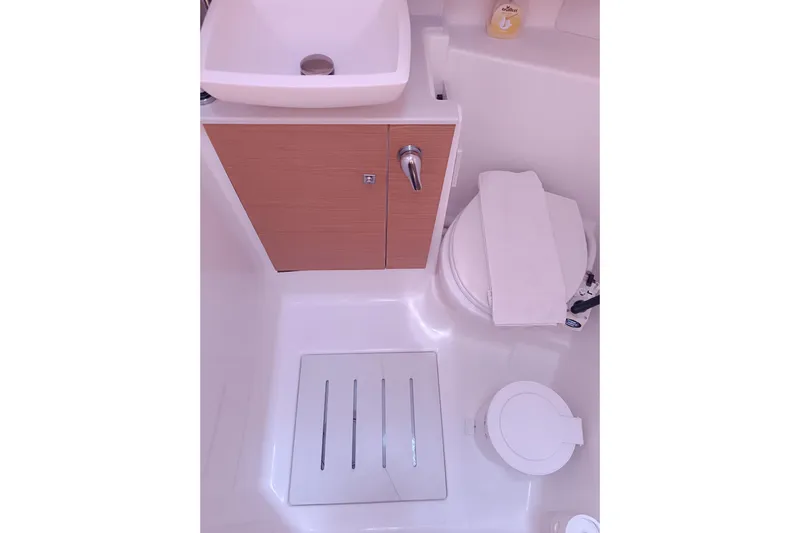  Yacht Photos Pics Bathroom interior of 2020 Dufour 430 yacht with sink, toilet, and shower area.