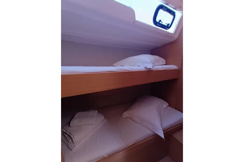  Yacht Photos Pics Bunk beds in 2020 Dufour 430 yacht cabin with natural light.