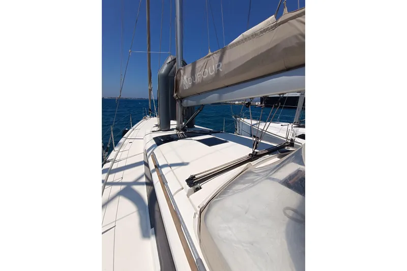  Yacht Photos Pics 2020 Dufour 430 sailboat deck with clear skies and ocean view.