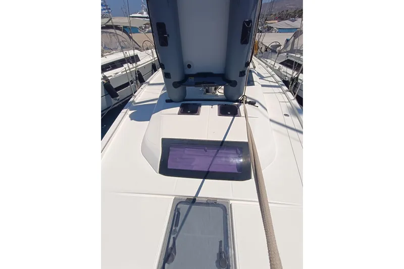  Yacht Photos Pics 2020 Dufour 430 yacht deck with open hatch and visible rigging.