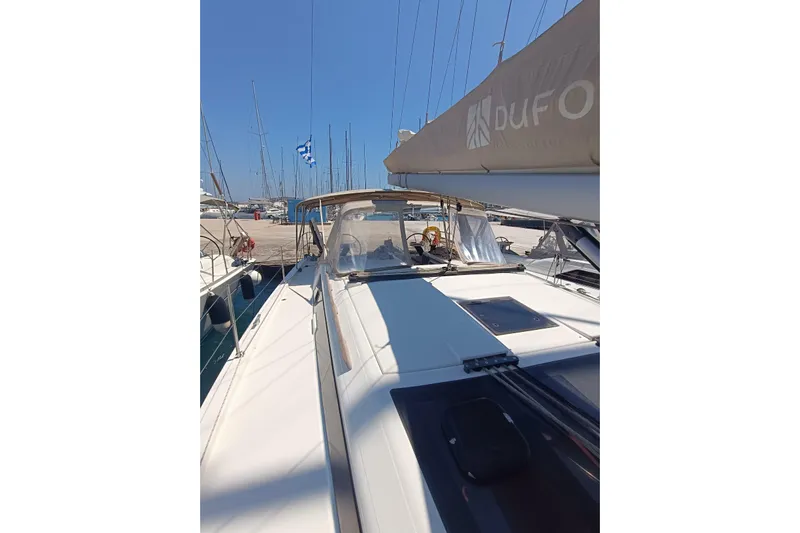  Yacht Photos Pics Dufour 430 sailboat docked at marina, 2020 model, clear blue sky.