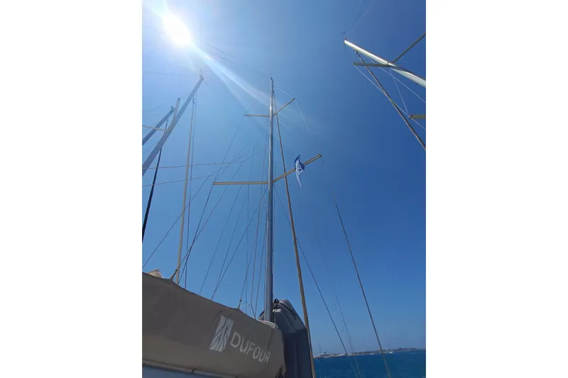  Yacht Photos Pics Sailing yacht Dufour 430 mast against clear blue sky, 2020 model.