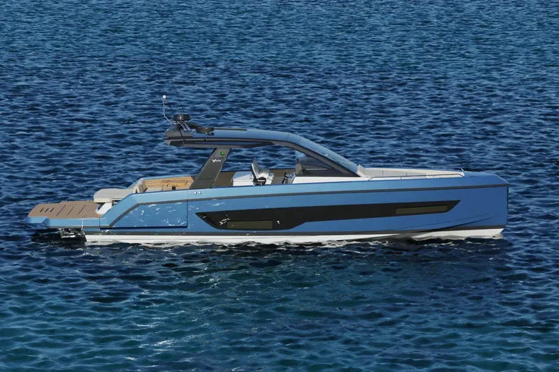  Yacht Photos Pics 2026 Schaefer V44 yacht on calm blue ocean waters.