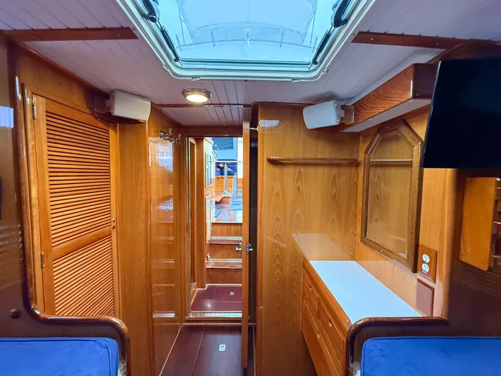 Argonaut Yacht Photos Pics Interior of 1984 Wilbur 38 boat with wooden finish and skylight.