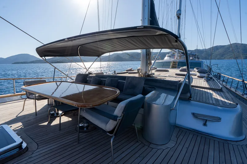 Silvermoon Yacht Photos Pics Luxurious 2010 Custom Gulet Motorsailer deck with shaded seating and ocean view.