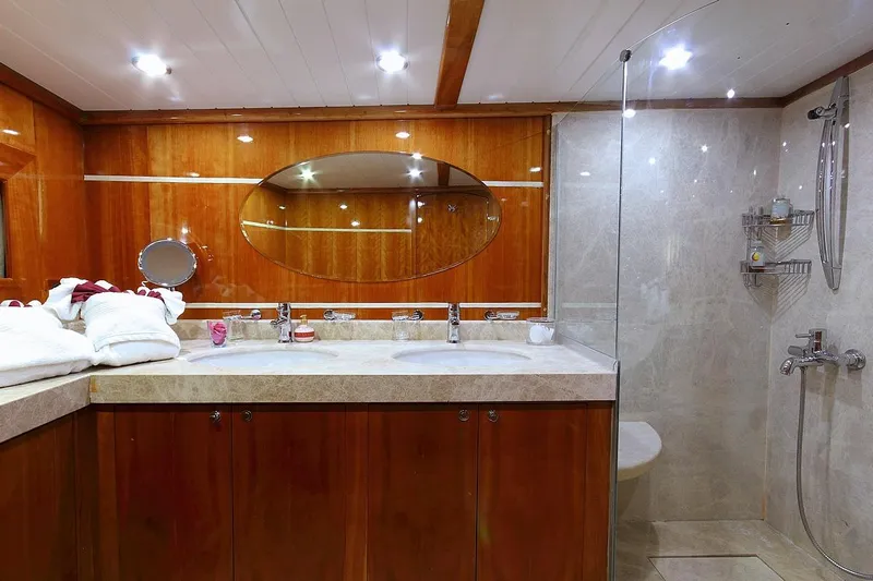 Silvermoon Yacht Photos Pics Luxurious bathroom on 2010 Custom Gulet Motorsailer with dual sinks and glass shower.