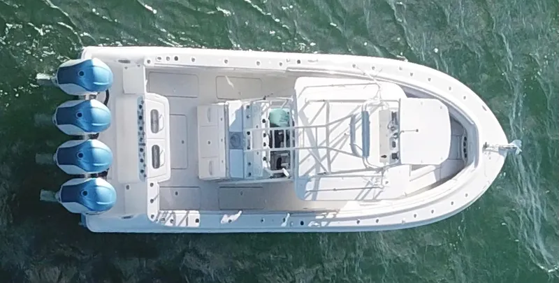  Yacht Photos Pics Aerial view of 2014 Hydra-Sports 42 boat with four outboard engines on water.