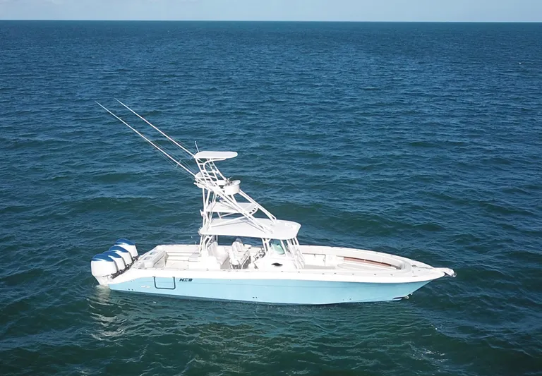  Yacht Photos Pics 2014 Hydra-Sports 42 boat on open ocean, featuring multiple outboard engines.