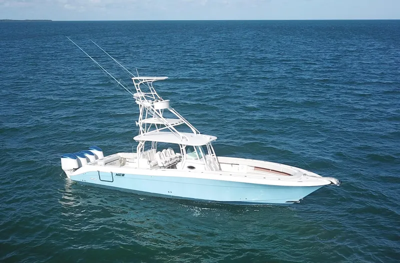  Yacht Photos Pics 2014 Hydra-Sports 42 boat on open ocean, featuring multiple outboard engines.